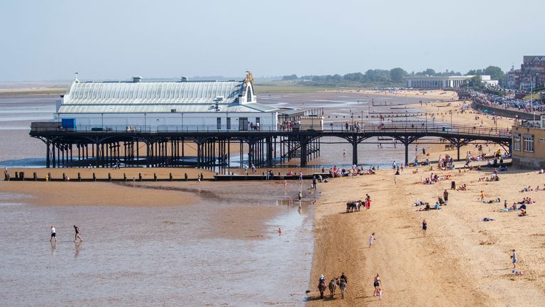 People enjoy the hot weather in Cleethorpes, Lincolnshire.