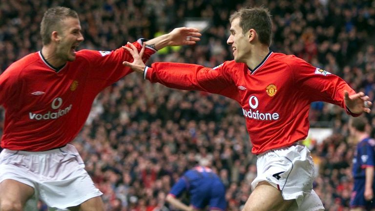 The former Manchester United teammates celebrating a goal at Old Trafford in February 2002