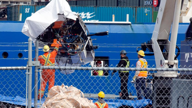 Debris from the Titan submersible, recovered from the ocean floor near the wreck of the Titanic, is unloaded from the ship Horizon Arctic at the Canadian Coast Guard pier in St. John&#39;s, Newfoundland
Pic:The Canadian Press /AP