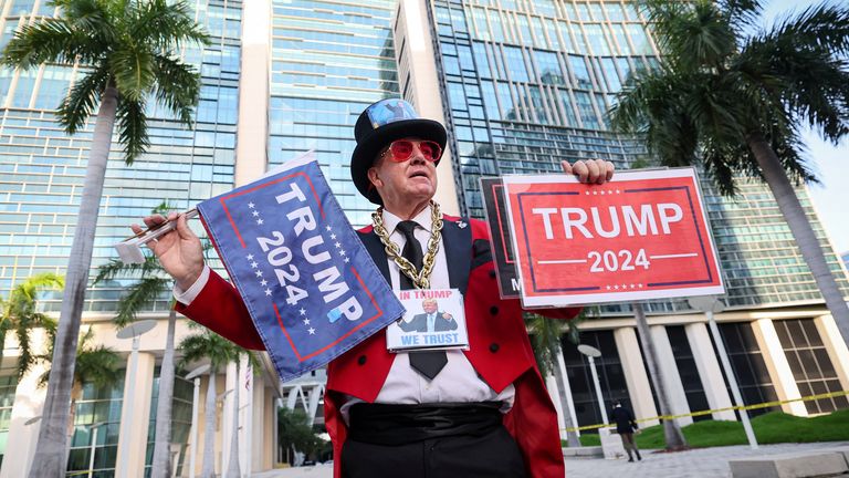 A supporter of U.S. President Donald Trump stands outside The Wilkie D. Ferguson Jr. United States Courthouse, on the morning former U.S. President Trump is to appear there on classified document charges, in Miami, Florida, U.S., June 13, 2023. REUTERS/Brendan McDermid
