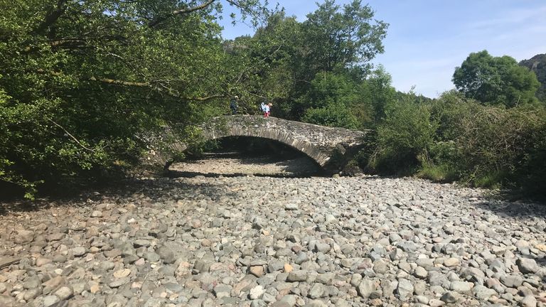 The completely dry riverbed of the River Derwent near Rosthwaite. Pic: West Cumbria Rivers Trust

