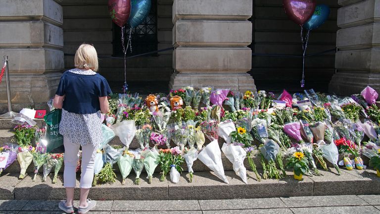 Flowers on the steps of Nottingham Council House after three people were killed and another three hurt in connected attacks on Tuesday morning. Picture date: Thursday June 15, 2023.

