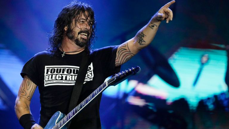 FILE - In this Sept. 29, 2019, file photo, Dave Grohl of the band Foo Fighters performs at the Rock in Rio music festival in Rio de Janeiro, Brazil. Foo Fighters will perform at the iHeartRadio Music Festival in Las Vegas. (AP Photo/Leo Correa, File)