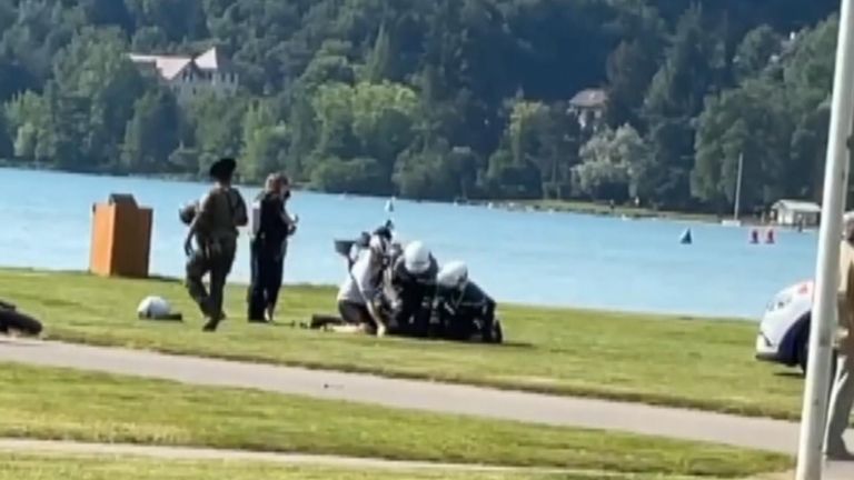 Two children and an adult are in life-threatening condition after a knife attack in Annecy in southeast France, police have said.
