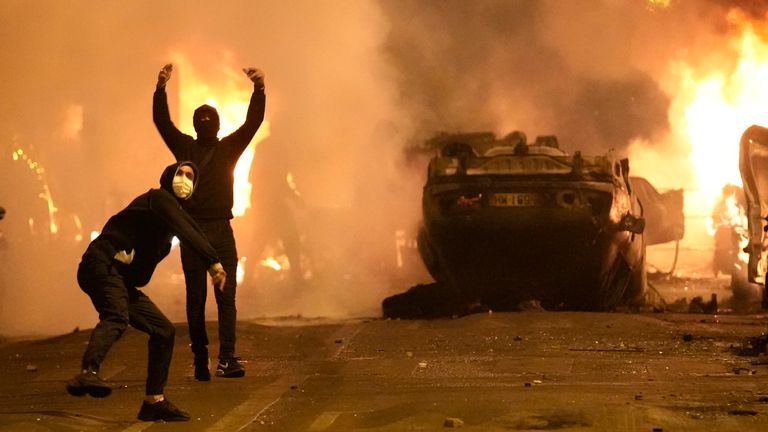 Youths clash with police forces in Nanterre, outside Paris, France. Pic: AP