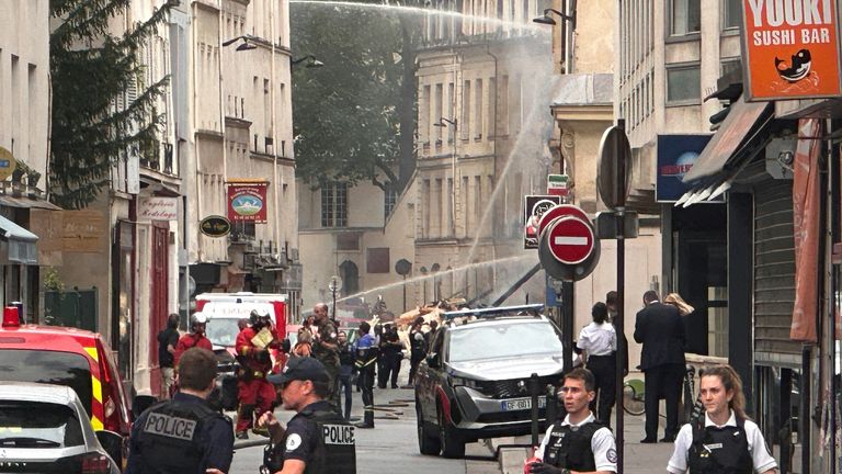 French police secure the area after several buildings on fire following a gas explosion in the fifth arrondissement of Paris, France, June 21, 2023. REUTERS/Antony Paone
