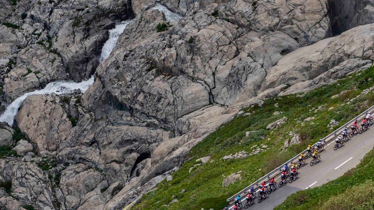 The pack climbs the Furka pass during the fifth stage, a 211 km race from Fiesch to La Punt, of the 86th Tour de Suisse  on June 15th 2023
Pic:AP