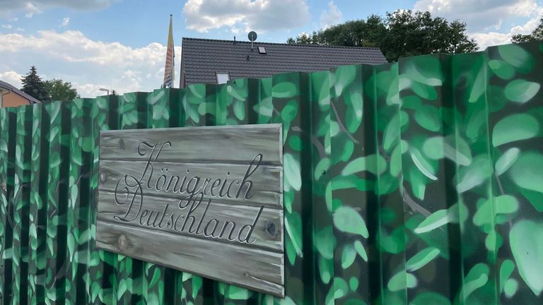 A sign on the fence reading &#39;Kingdom of Germany&#39;