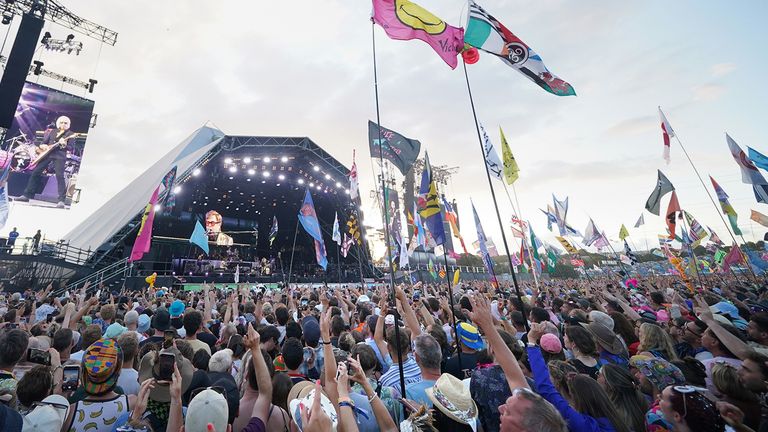 EDITORIAL USE ONLY Crowds watch Elton John performing on the Pyramid Stage at the Glastonbury Festival at Worthy Farm in Somerset. Picture date: Sunday June 25, 2023.