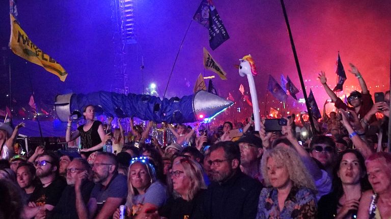 EDITORIAL USE ONLY..Crowds watch Elton John performing on the Pyramid Stage at the Glastonbury Festival at Worthy Farm in Somerset. Picture date: Sunday June 25, 2023. PA Photo. See PA story SHOWBIZ Glastonbury. Photo credit should read: Yui Mok/PA Wire