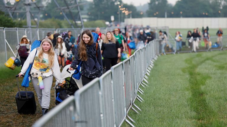People arrive to attend the Glastonbury Festival, in Glastonbury, Britain, June 21, 2023.  REUTERS/Jason Cairnduff