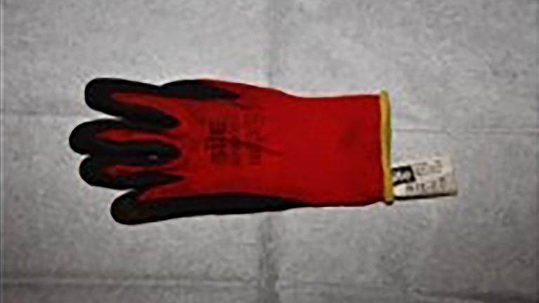 Undated handout photo issued by Merseyside Police of a red glove jurors in the trial of Connor Chapman, who is accused of murdering Ms Edwards. The glove was recovered from the house of Thomas Waring, who is charged with assisting an offender and possessing a prohibited firearm