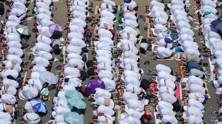 Muslim pilgrims pray outside Namira Mosque in Arafat, on the second day of the annual Hajj pilgrimage, near the holy city of Mecca, Saudi Arabia, Tuesday, June 27, 2023. Around two million pilgrims are converging on Saudi Arabia&#39;s holy city of Mecca for the largest Hajj since the coronavirus pandemic severely curtailed access to one of Islam&#39;s five pillars. (AP Photo/Amr Nabil)