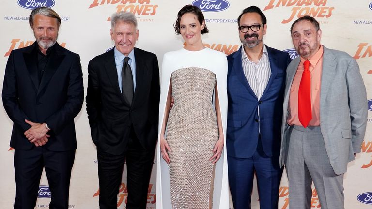 Mads Mikkelsen, Harrison Ford, Phoebe Waller-Bridge, James Mangold and John Rhys-Davies arrive for the UK premiere of Indiana Jones and the Dial of Destiny at Cineworld Leicester Square in London. Picture date: Monday June 26, 2023. PA Photo. See PA story SHOWBIZ Indiana Jones. Photo credit should read: Ian West/PA Wire