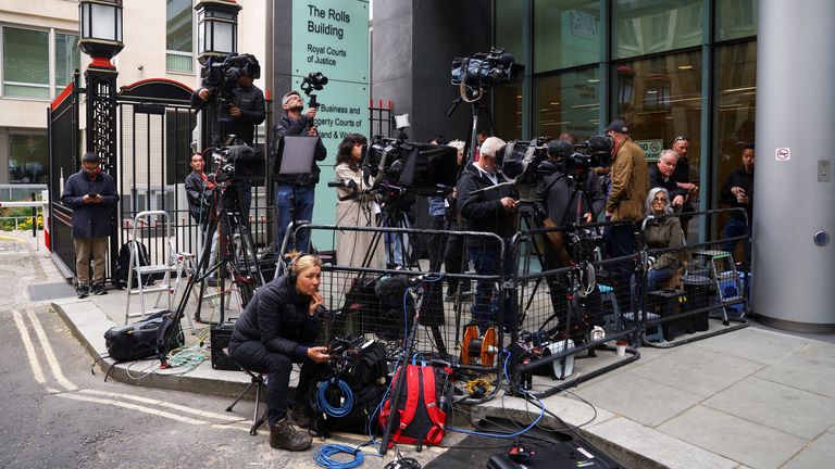 Media wait for Prince Harry at the High Court on Monday - only for him not to turn up