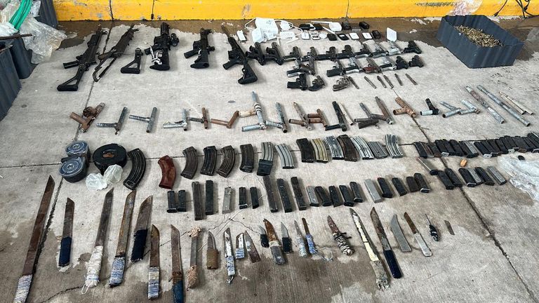 Weapons, magazines, ammunition and handmade weapons are seized. Pic: Honduras Armed Forces/Reuters