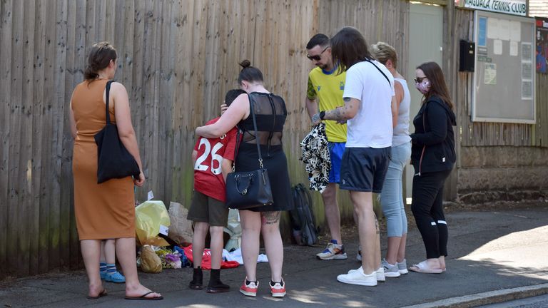 Ian Coates&#39; family at the scene where he was found stabbed