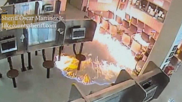 Suspect caught on CCTV setting fire to waiting area in Indiana jail