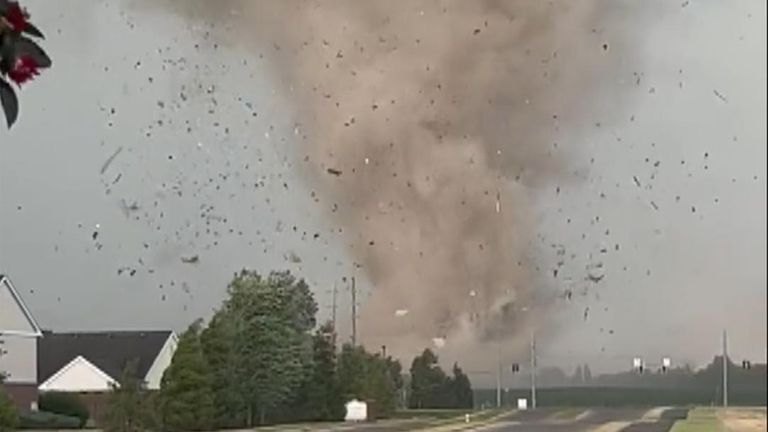 Large funnel cloud sends debris flying in Indiana