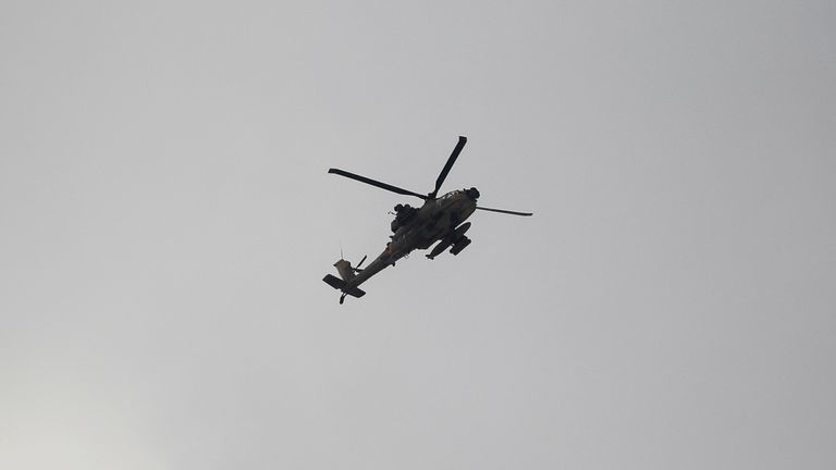 A helicopter flies during an Israeli raid in Jenin, in the Israeli-occupied West Bank June 19, 2023. REUTERS/Raneen Sawafta
