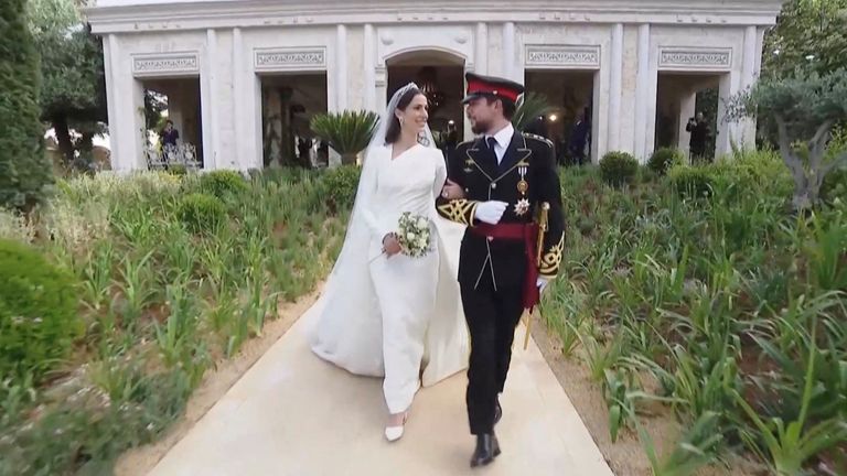 Jordan&#39;s Crown Prince Hussein and Rajwa Al Saif are seen together at their royal wedding ceremony, in Amman, Jordan