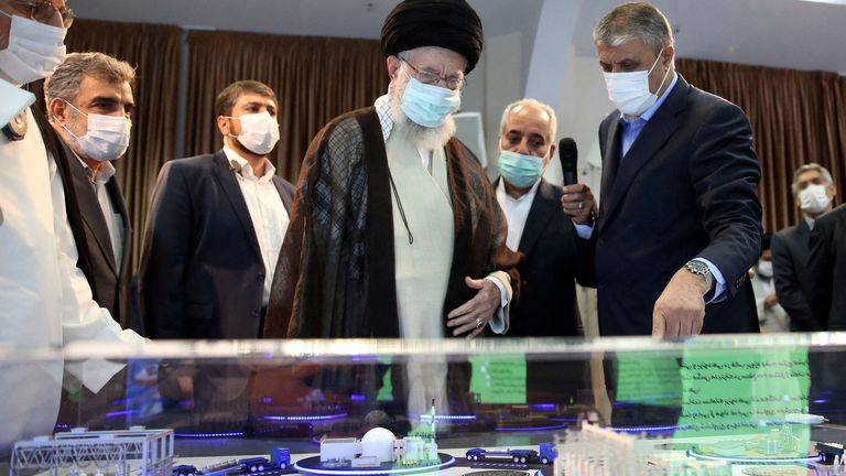 Iran's Supreme Leader Ayatollah Ali Khamenei views a model of a nuclear facility, in Tehran, Iran June 11, 2023