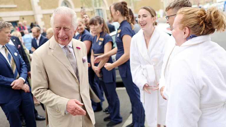 King Charles meets employees and clients of the spa during his visit at Poundbury, in Dorchester