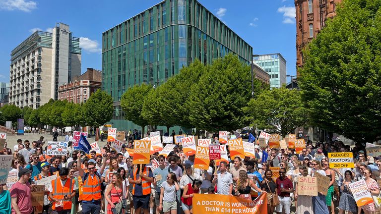 Striking junior doctors from British Medical Association take part in a rally in Manchester