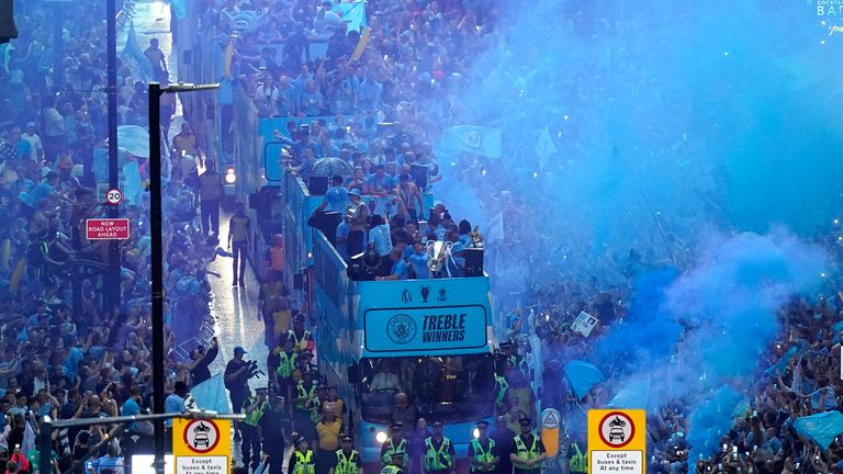 A general view of the team buses passing by fans during the Treble Parade in Manchester. Manchester City completed the treble (Champions League, Premier League and FA Cup) after a 1-0 victory over Inter Milan in Istanbul secured them Champions League glory. Picture date: Monday June 12, 2023.