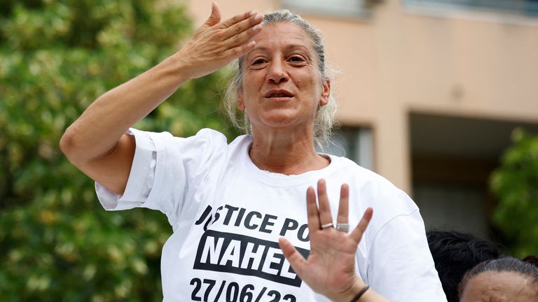 Mounia, the mother of Nahel, a 17-year-old teenager killed by a French police officer in Nanterre during a traffic stop, blows a kiss to the crowd as she attends a march in tribute to his son in Nanterre, Paris suburb, France, June 29, 2023. REUTERS/Sarah Meyssonnier
