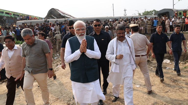 Mr Modi at the crash site on Saturday. Pic: Government of India