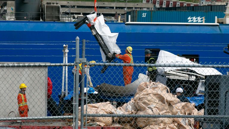 Debris from the Titan submersible, recovered from the ocean floor near the wreck of the Titanic, is unloaded from the ship Horizon Arctic at the Canadian Coast Guard pier in St. John&#39;s, Newfoundland
Pic:The Canadian Press/AP