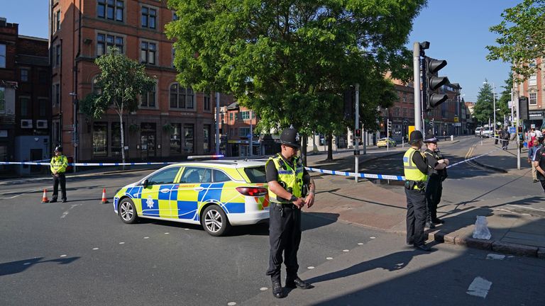 Police officers at the Maid Marian Way junction of Upper Parliament Street in Nottingham, as police have put in place multiple road closures in Nottingham as officers deal with an ongoing serious incident. The Nottingham Express Transit (NET) tram network said it has suspended all services due to "major police incidents around the city and suburbs". Picture date: Tuesday June 13, 2023.