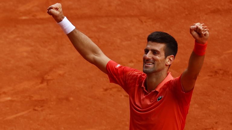 Novak Djokovic celebrates winning the French Open final