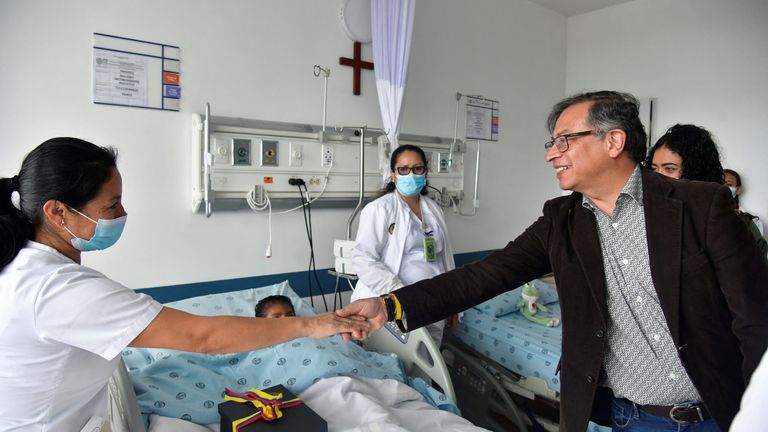 President Gustavo Petro greets the doctors during his hospital visit. Pic: Reuters 