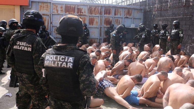 Members of the Military Police of Public Order guard gang members after the Honduras Armed Forces took over the control of the prisons nationwide as part of the "Fe y Esperanza" operation, in this handout picture released on June 26, 2023. Honduras Armed Forces/Handout via REUTERS THIS IMAGE HAS BEEN SUPPLIED BY A THIRD PARTY. NO RESALES. NO ARCHIVES
