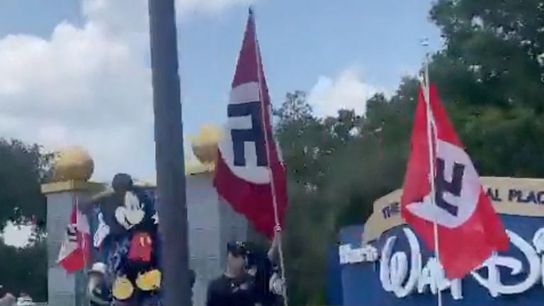 People displaying Nazi flags and symbols protest outside the entrance to Walt Disney World Resort. Pic:  Rep. Anna V. Eskamani
