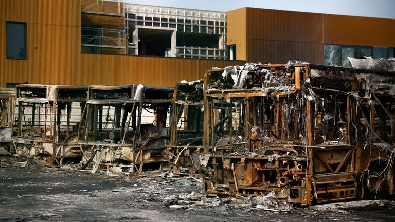 View of burnt buses at a RATP bus depot damaged during night clashes between protesters and police, following the death of Nahel, a 17-year-old teenager killed by a French police officer in Nanterre during a traffic stop, in Aubervilliers, near Paris, France, June 30, 2023. REUTERS/Sarah Meyssonnier
