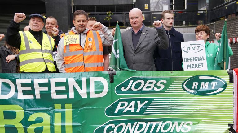 Rail, Maritime and Transport union general secretary Mick Lynch (centre right) joins members of his union on the picket line outside Euston station, London, during their long-running dispute over pay. Picture date: Saturday May 13, 2023.