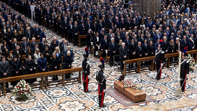 Italian President Sergio Mattarella stands near the coffin during the state funeral of former Prime Minister Silvio Berlusconi at Duomo Cathedral in Milan, Italy June 14, 2023. Italian Presidency/Handout via REUTERS THIS IMAGE HAS BEEN SUPPLIED BY A THIRD PARTY.