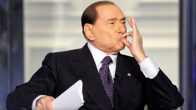 FILE PHOTO: Italy&#39;s former Prime Minister Silvio Berlusconi gestures as he appears as a guest on the RAI television show Porta a Porta (Door to Door) in Rome, Italy, January 9, 2013. REUTERS/Remo Casilli/File Photo
