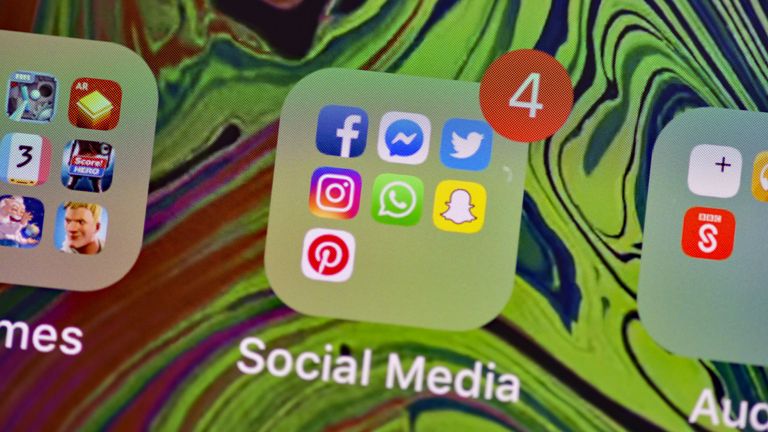 Stock photo of Facebook, Messenger, Twitter, Instagram, WhatsApp, Snapchat and Pinterest, social media app icons on a smart phone.