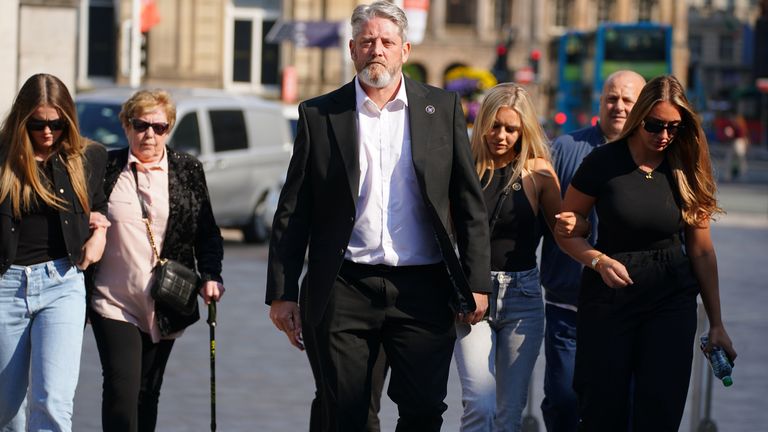 The father of Elle Edwards, Tim Edwards, (centre) arrives with family members at the Queen Elizabeth II Law Courts in Liverpool where Connor Chapman is charged with her murder, two counts of attempted murder, three counts of wounding with intent, possessing a firearm with intent to endanger life, possessing ammunition with intent to endanger life and handling stolen goods. Picture date: Tuesday June 13, 2023.