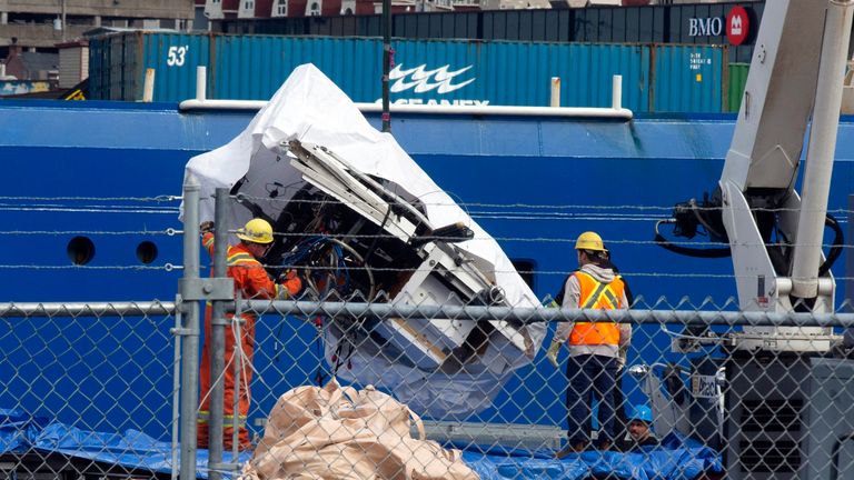 Debris from the Titan submersible, recovered from the ocean floor near the wreck of the Titanic, is unloaded from the ship Horizon Arctic at the Canadian Coast Guard pier in St. John&#39;s, Newfoundland
Pic:The Canadian Press /AP