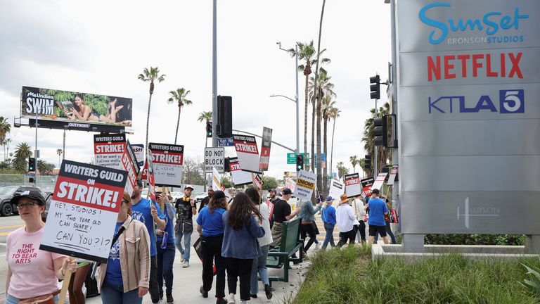 Writers Guild of America members and supporters picket outside Sunset Bronson Studios and Netflix Studios, after union negotiators called a strike for film and television writers, in Los Angeles, California, U.S., May 3, 2023. REUTERS/Mario Anzuoni