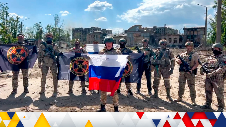 FILE - In this grab taken from video and released by Prigozhin Press Service Saturday, May 20, 2023, Yevgeny Prigozhin, the head of the Wagner Group military company speaks holding a Russian national flag in front of his soldiers in Bakhmut, Ukraine. Prigozhin, the outspoken millionaire head of the private military contractor Wagner, has targeted Russian military leaders with expletive-riddled insults, blaming them for the failure to provide his troops with enough ammunition. (Prigozhin Press Se