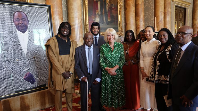 EMBARGOED TO 0001 THURSDAY JUNE 22 Previously unissued photo dated 14/06/23 of Queen Camilla with Laceta Reid (second left)and his family during a reception at Buckingham Palace in London, to mark the 75th anniversary of the arrival of HMT Empire Windrush to Tilbury Docks in Essex, on June 22 1948. Issue date: Thursday June 22, 2023.