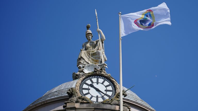 The Windrush flag flies over Liverpool Town Hall, marking the 75th anniversary of the arrival of the HMT Empire Windrush ship in Tilbury, Essex, carrying Caribbean families to the UK to help fill post-war labour shortages. Picture date: Thursday June 22, 2023.