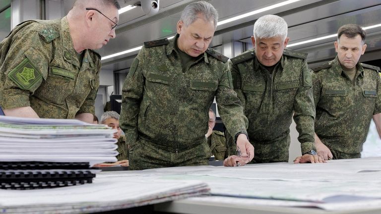 Russian Defence Minister Sergei Shoigu and Colonel General Yevgeny Nikiforov (2-R), commander of troops of the Western Military District, visit the advanced control post of Russian troops involved in Russia-Ukraine conflict, at an unknown location, in this picture released June 26, 2023. Russian Defence Ministry/Handout via REUTERS ATTENTION EDITORS - THIS IMAGE WAS PROVIDED BY A THIRD PARTY. NO RESALES. NO ARCHIVES. MANDATORY CREDIT.