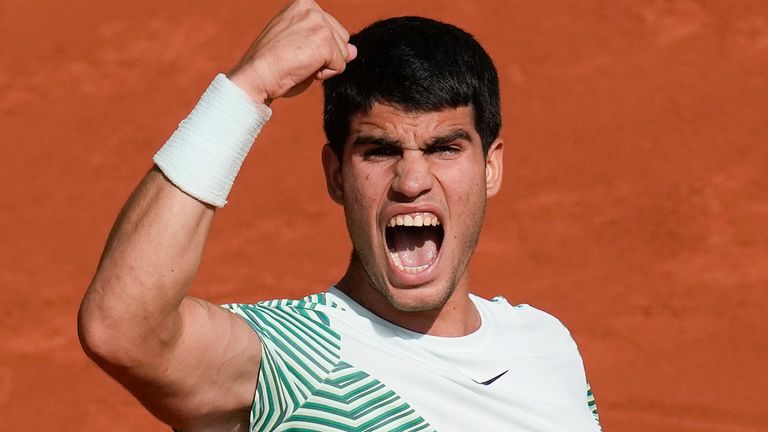 Spain&#39;s Carlos Alcaraz clenches his fist after scoring a point against Serbia&#39;s Novak Djokovic during their semifinal match of the French Open tennis tournament of the French Open tennis tournament at the Roland Garros stadium in Paris, Friday, June 9, 2023. (AP Photo/Christophe Ena)